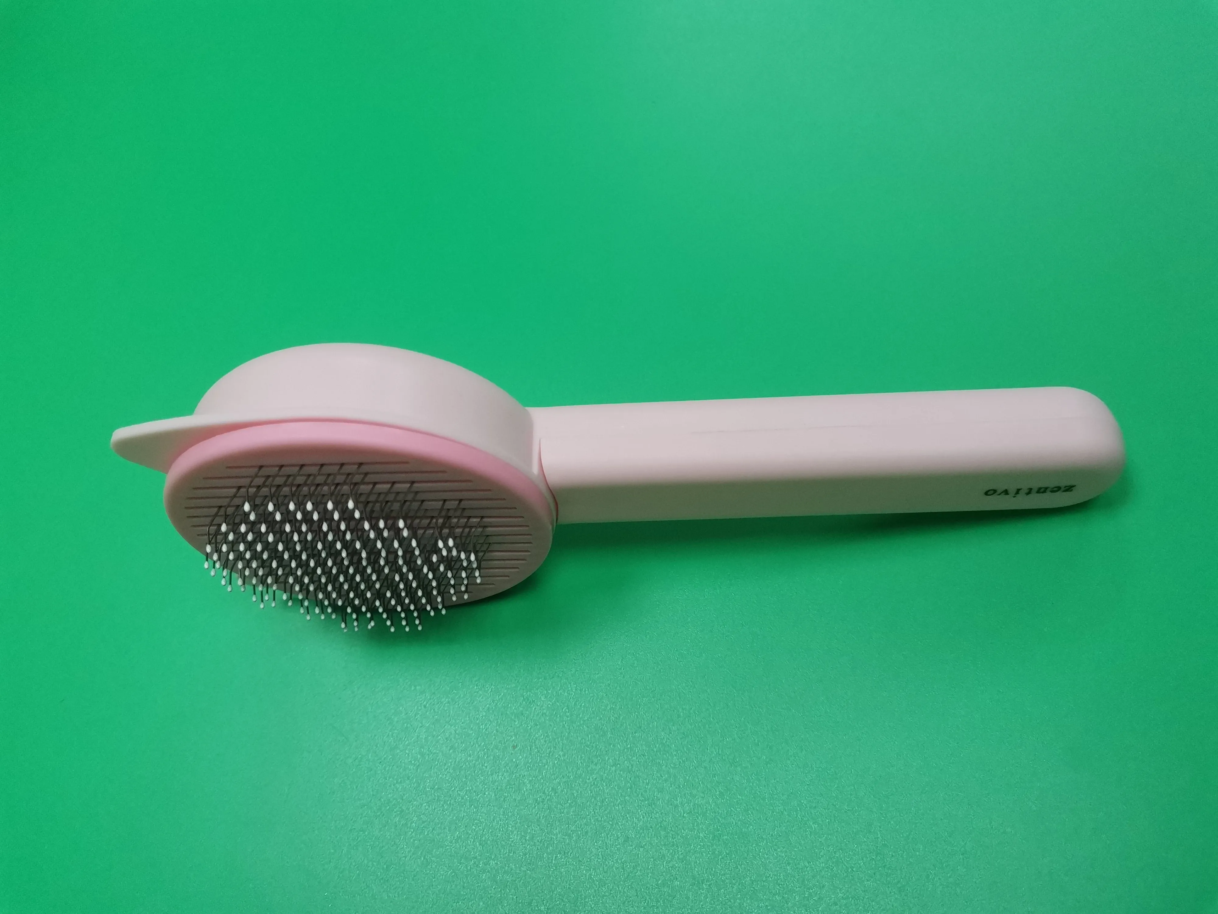 Zentivo Grooming tools for pets, namely, combs and brushes,Pet self-cleaning brush
