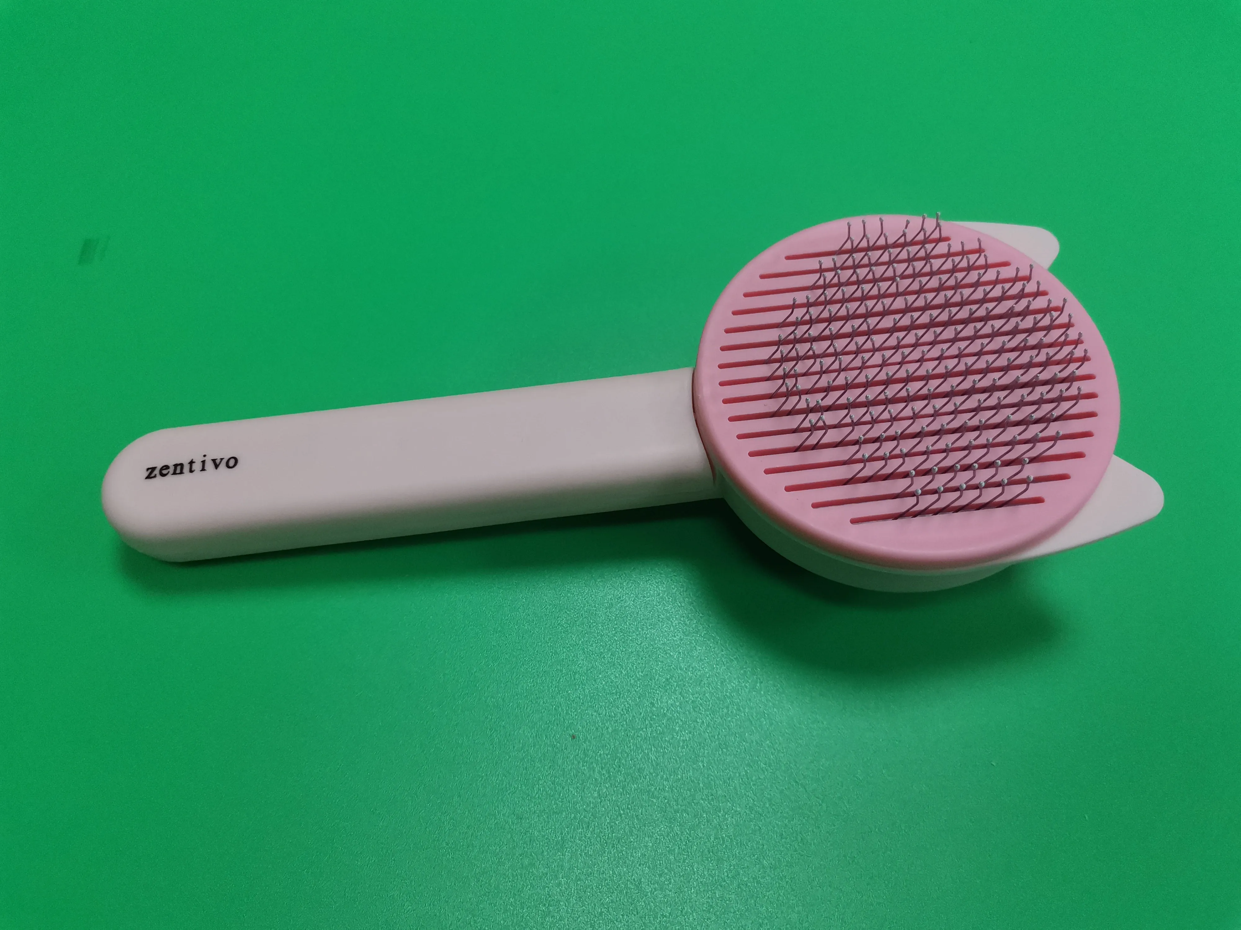 Zentivo Grooming tools for pets, namely, combs and brushes,Pet self-cleaning brush